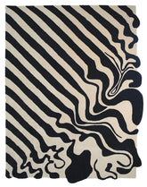 Luxury beige and black hand-tufted wool area rug with modern flow stripe design.